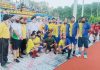 Winning team posing for a group photograph along with dignitaries at KK Hakku Stadium in Jammu on Tuesday
