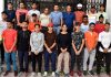 Selected team posing for a group photograph with officials of J&K Sports Council at Jammu on Thursday.