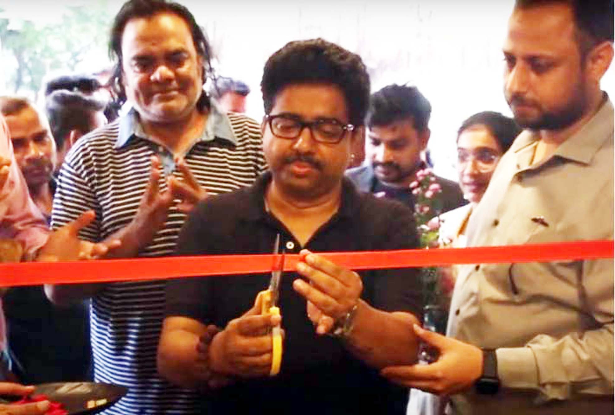 A dignitary inaugurating 2nd outlet of ESPATO - My Learn Coffee in Andheri West, Mumbai.