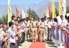DGP Dilbag Singh interacting with students during the closing ceremony of Shaheed Aman Memorial tournament at Kishtwar on Monday.
