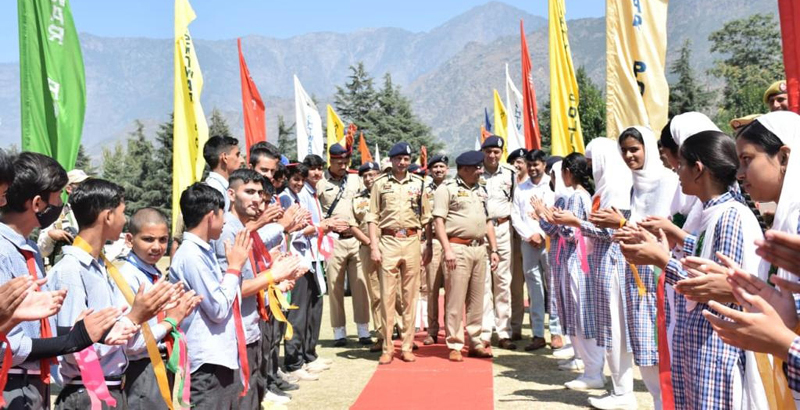 DGP Dilbag Singh interacting with students during the closing ceremony of Shaheed Aman Memorial tournament at Kishtwar on Monday.