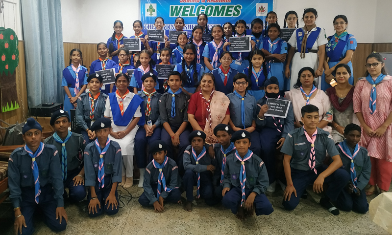Participants posing for a group photograph along with dignitaries at Scouts and Guides headquarter Jammu on Wednesday.