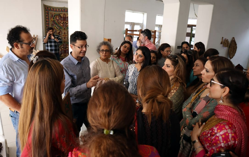 Director Handicrafts Mahmood Ahmad Shah interacting with female members of FICCI FLO group in Srinagar.