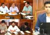DC Dr Owais Ahmed chairing a meeting on Tuesday.