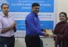 Director IIMC Jammu presenting memento to guest speaker during a discussion programme.