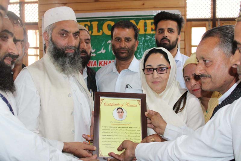 Waqf Board Chairperson, Dr Darakhshan Andrabi being felicitated by Moulvis and others at Sufi Shrine in Baramulla on Saturday.