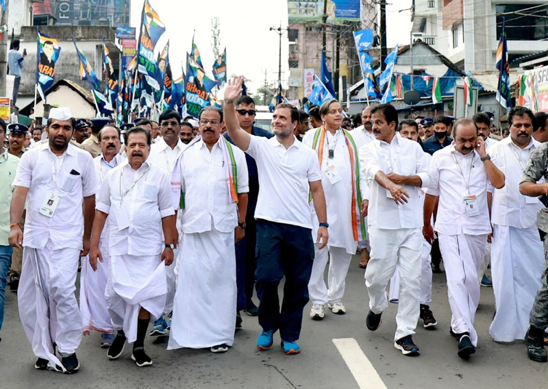 Congress leader Rahul Gandhi with party leaders and supporters during the Bharat Jodo Yatra, in Kerala border 'Parassala' in Thiruvananthapuram on Sunday. (UNI)