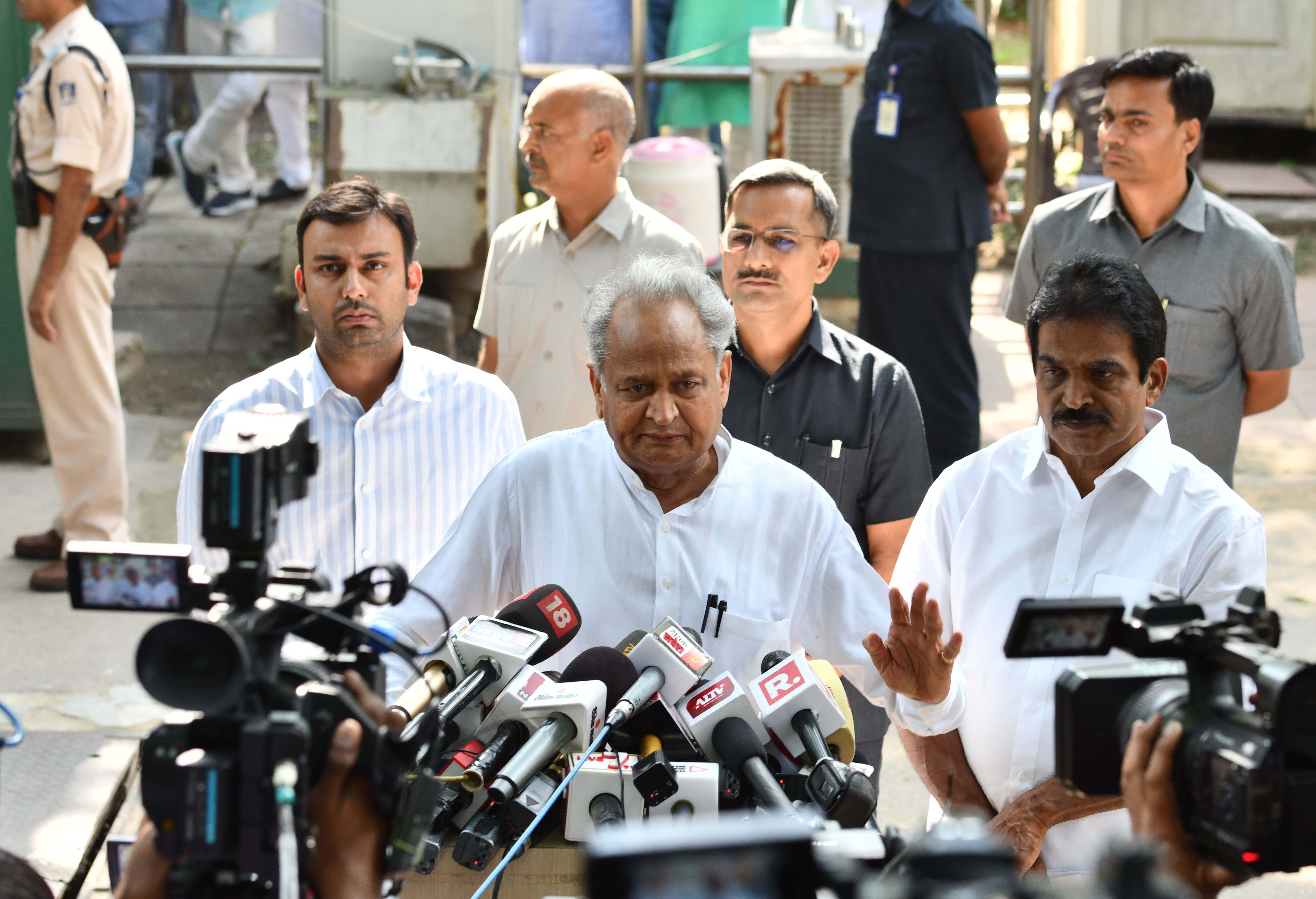 Rajasthan Chief Minister Ashok Gehlot and Congress leader K C Venugopal speaking to media after meeting party interim President Sonia Gandhi at 10 Janpath in New Delhi on Thursday. (UNI)