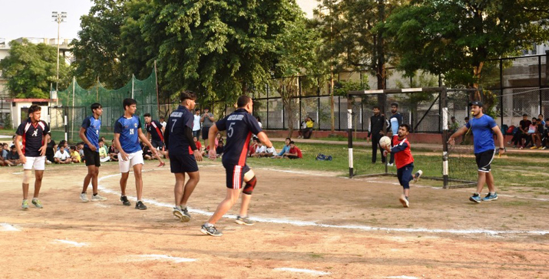 Players in action during the Handball match at Shastri Nagar on Friday.