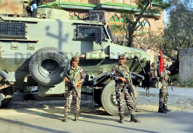 Security personnel near the site of militant attack at Pulwama on Sunday. -Excelsior/Younis Khaliq