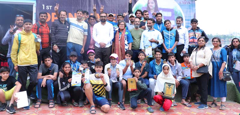 Winners posing for a group photograph at Water Sports Centre Nigeen in Srinagar on Saturday.