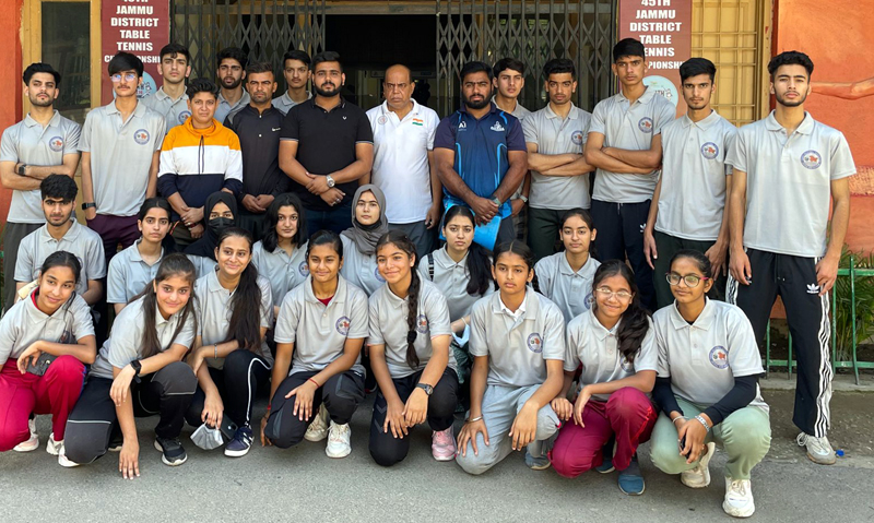 Selected team posing for a group photograph alongwith Divisional Sports Officer Jammu Ashok Singh on Monday.