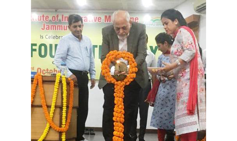 Chief guest lighting ceremonial lamp during CSIR foundation day celebration at Jammu on Monday.