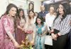 Vandana Luthra and others lighting lamp to inaugurate VLCC Institute of Beauty & Nutrition at Trikuta Nagar Jammu. -Excelsior/Rakesh