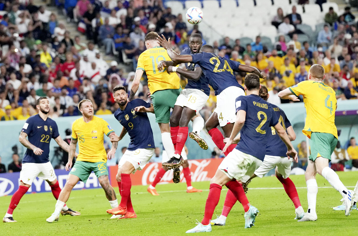 Harry Souttar (top L) of Australia, Dayot Upamecano (top C) of France vie for header during the match between France and Australia at Al Wakrah in Qatar. (UNI)