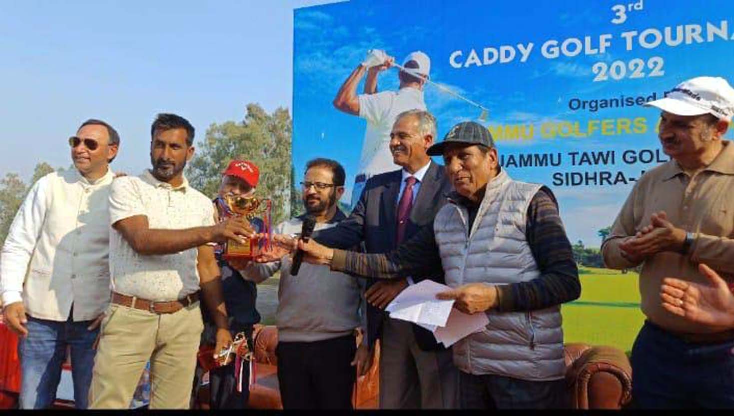 Mukhtayar Ali, overall winner of the tournament receiving the trophy from NS Jamwal, chief guest in presence of R S Chib and Manav Gupta at JTGC on Monday.