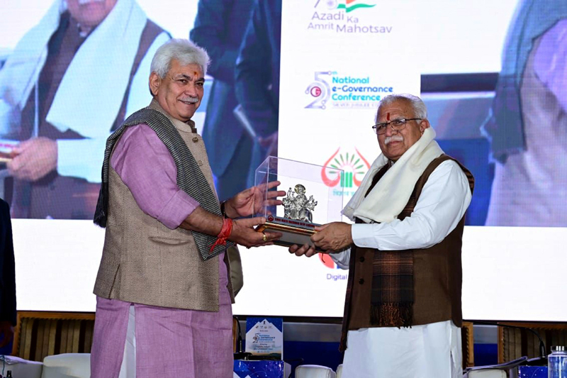 Lieutenant Governor Manoj Sinha presenting a token to Chief Minister of Haryana Manohar Lal Khattar at an event in Katra on Sunday.