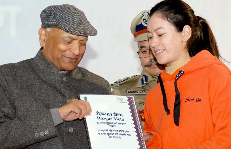 LG Ladakh R K Mathur giving appointment order to a girl in Leh on Tuesday.