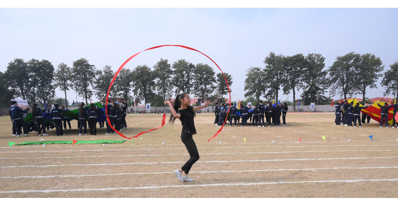 A student displaying her skills during ‘Annual Sports Day’ at Heritage School in Jammu on Friday.