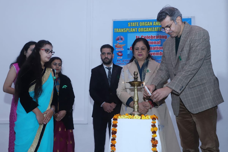 Principal GMC Jammu Dr Shashi Sudhan Sharma and others during a function in College auditorium.