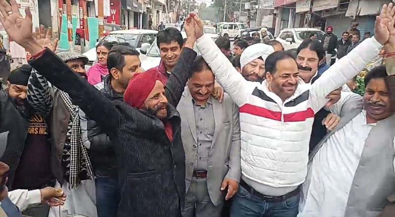 Cong workers celebrating party victory in Himachal Pradesh during function in Jammu.