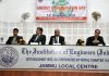 Speakers during celebration of Energy Conservation Day at Jammu on Wednesday.