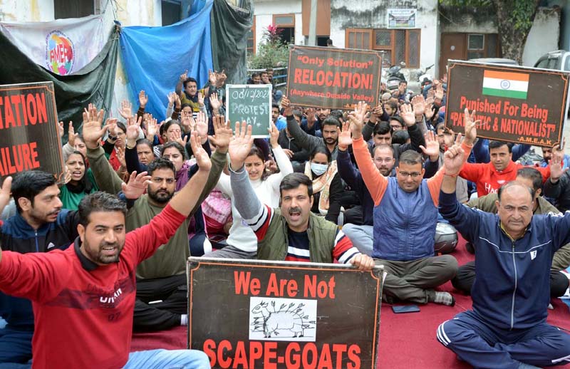 PM package employees protesting in front of Relief and Rehabilitation Commissioner's office at Jammu on Thursday.-Excelsior/Rakesh