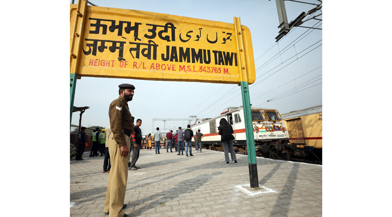 A cop stands to guard at Jammu Railway Station on Friday. -Excelsior/Rakesh