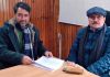 AAP leader during a meeting with Advisor R R Bhatnagar at Srinagar on Saturday.