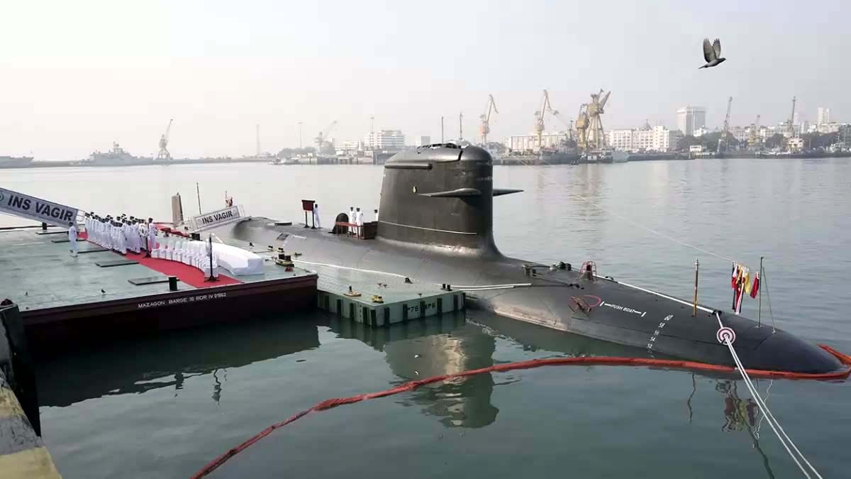 Naval officers onboard the fifth Kalvari-class submarine 'INS Vagir' during its commissioning ceremony, at the Naval Dockyard in Mumbai.