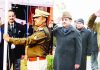 Acting CJ Justice Tashi Rabstan unfurling National Flag in Jammu wing of High Court (L) and Justice Vinod Chatterji Koul saluting Tricolor at Srinagar. (R).