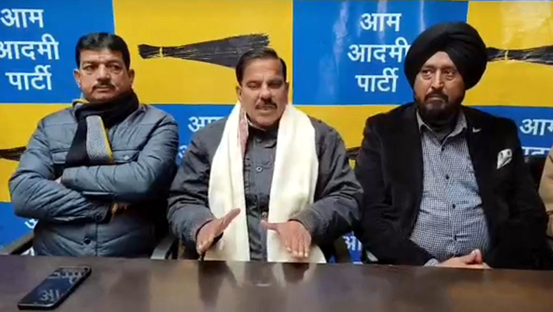Harsh Dev Singh addressing a press conference at AAP office in Jammu on Saturday.