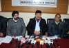 JKPCC contractors addressing media in Jammu on Friday. -Excelsior/Rakesh