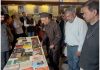 Former Governor of J&K, Dr Karan Singh looking at books at a stall arranged during ‘Tawi Art Fest in Jammu on Monday.’