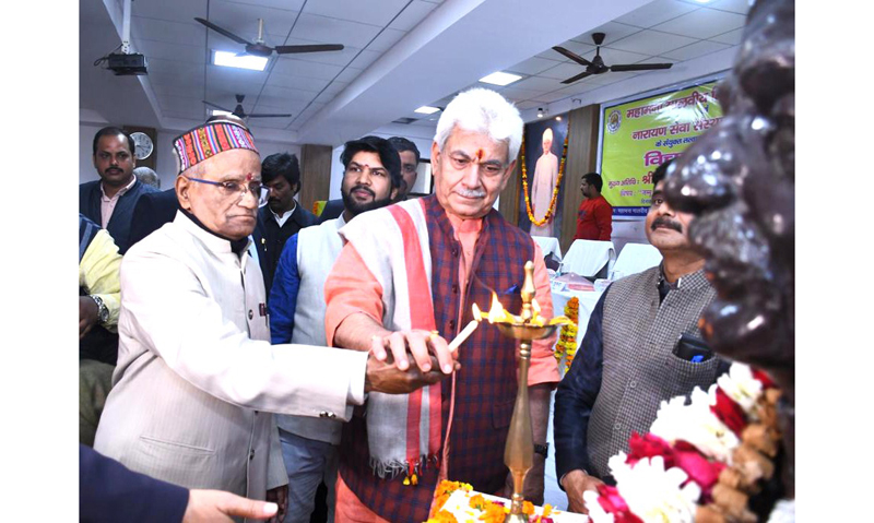 LG Manoj Sinha lighting lamp during a function at Lucknow on Tuesday.
