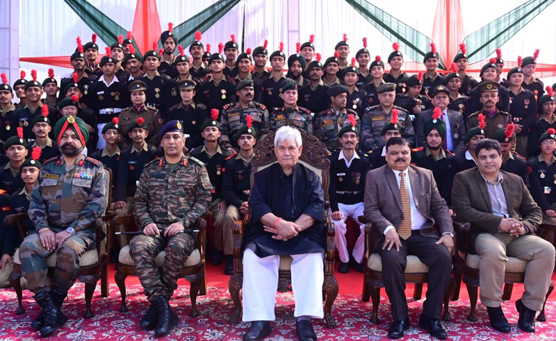 Lt Governor Manoj Sinha with NCC cadets posing for a group photograph at Raj Bhawan on Saturday.