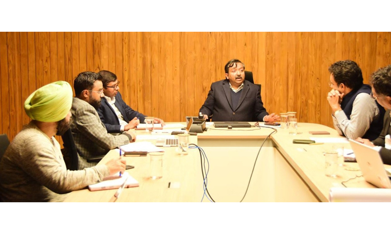 Principal Secretary Dheeraj Gupta chairing a meeting at Jammu.