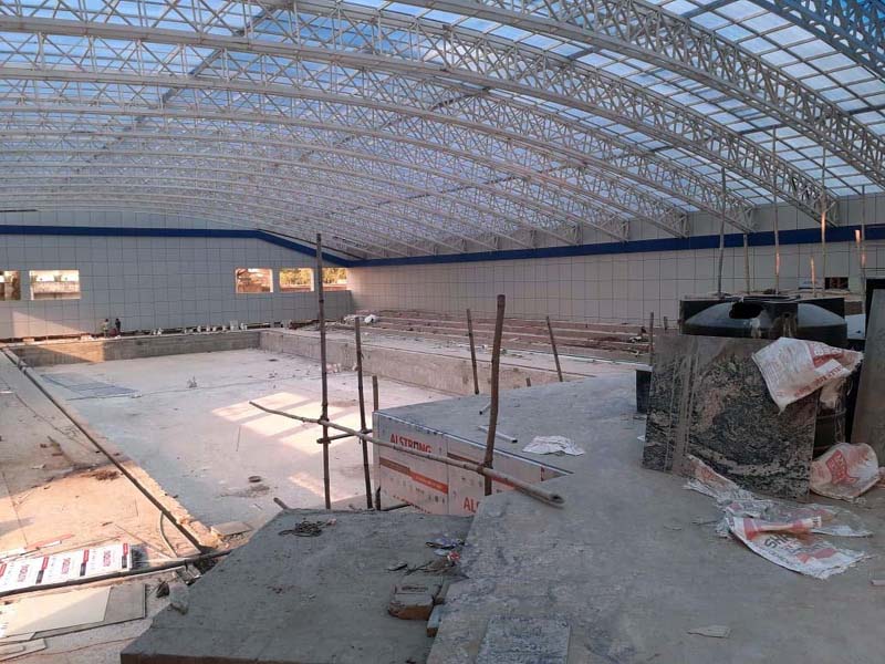 A view of under construction Swimming Pool at MA Stadium.