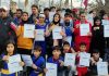 Winners of Boxing Championship displaying certificates while posing for group photograph on Tuesday.