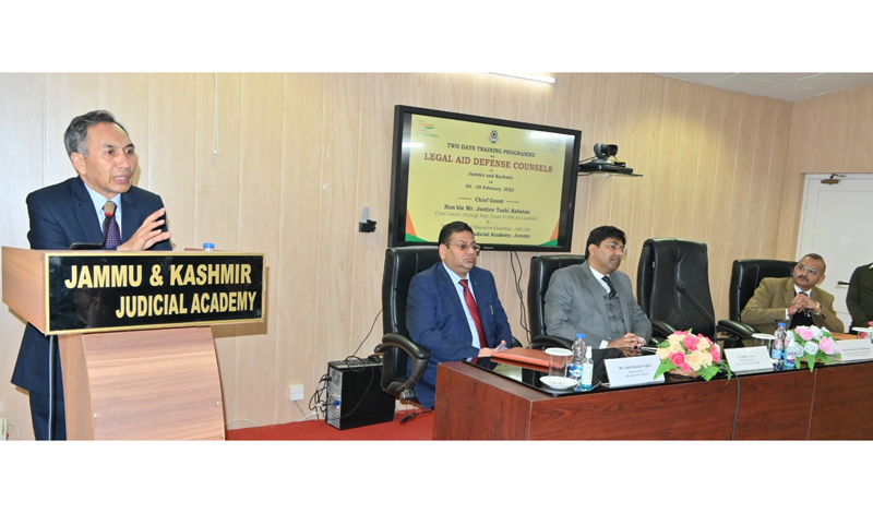 Justice Tashi Rabstan speaking during training programme at Jammu on Saturday.