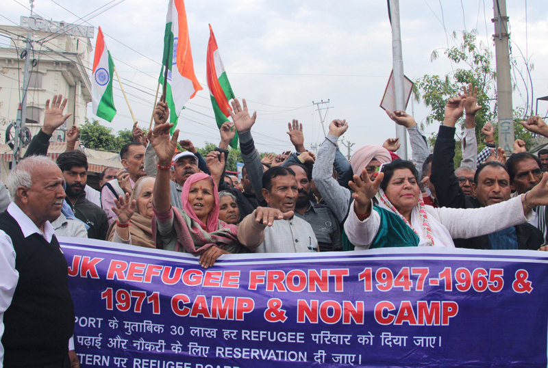 PoJK DPs staging protest demonstration near Hari Singh Park in Jammu on Tuesday. —Excelsior/Rakesh