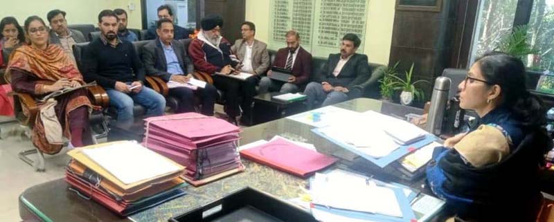 DC Jammu chairing a meeting on Tuesday.