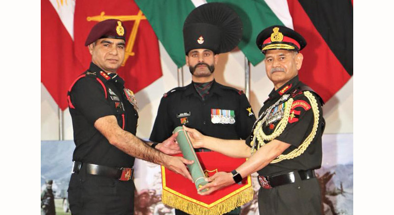 A soldier being honoured at the Northern Command Investiture Ceremony held at Mathura on Thursday.