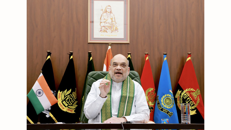 `Union Home Minister Amit Shah addresses 'Kashmir Mahotsav' organised by Indian Institute of Sustainability, Gujarat University via video conferencing on Thursday.