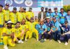 Players posing for a group photograph at Ayush Cricket Stadium Dehradun on Sunday.