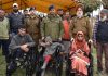SSP Pulwama Mohd Yousuf posing with beneficiaries at Pulwama on Friday.