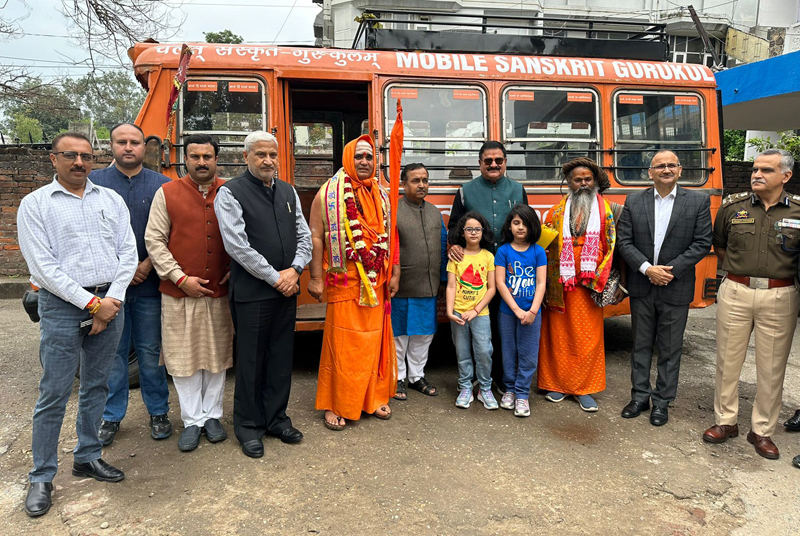 Swami Adhokshajanand Devtirth posing with former minister Sham Lal Sharma and others after starting Mobile Sanskrit Gurukul class at SR College, Gandhi Nagar, Jammu.