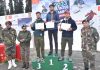 Winners of Ski competitions posing with Army officers at Gulmarg on Friday.