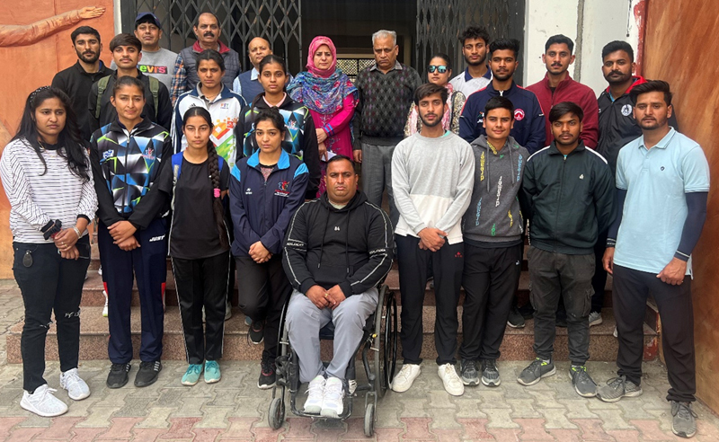Players posing with Central Sports Officer Nusrat Gazala, Divisional Sports Officer Ashok Singh and others at MA Stadium on Friday.
