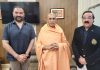 Trustees of Dharmarth Trust J&K, Ajatshatru Singh and Ranvijay Singh posing with Swami Avdheshanand Giriji at Jammu.